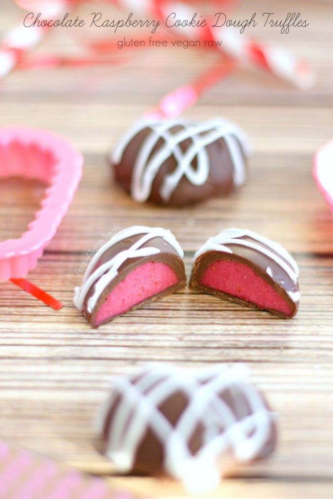 Chocolate Raspberry Cookie Dough Truffles (gluten free Vegan raw) Chocolate covered raspberry flavored cookie dough. A no bake natural red treat. 