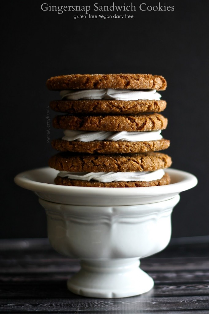 Gingersnap Cookies Sandwiches (gluten free vegan dairy free)- Crisp chewy gingersnap cookies filled with coconut cream that's light and fluffy.
