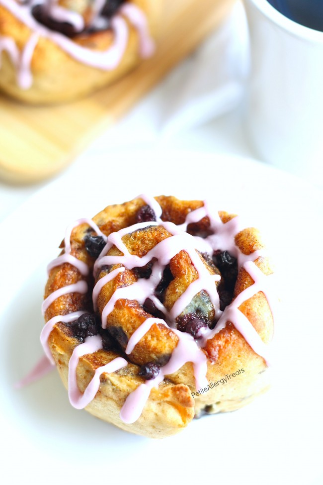 Gluten Free Blueberry Cinnamon Rolls Recipe (Gluten Free Vegan dairy free egg free)- Soft and sweet gluten free cinnamon buns with real blueberries. Hard to believe they are dairy free and food allergy friendly too!