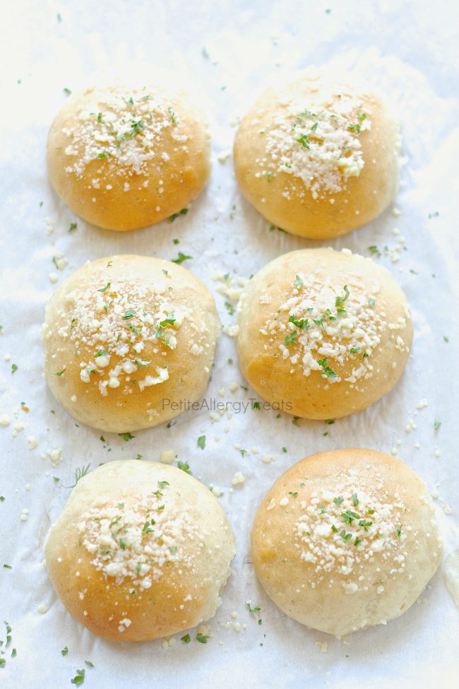 Gluten Free Dinner Rolls Recipe (dairy free vegan)- Light and fluffy garlic parmesan gluten free rolls or hamburger buns. Soft and delicious warm from the oven. Food Allergy friendly too!