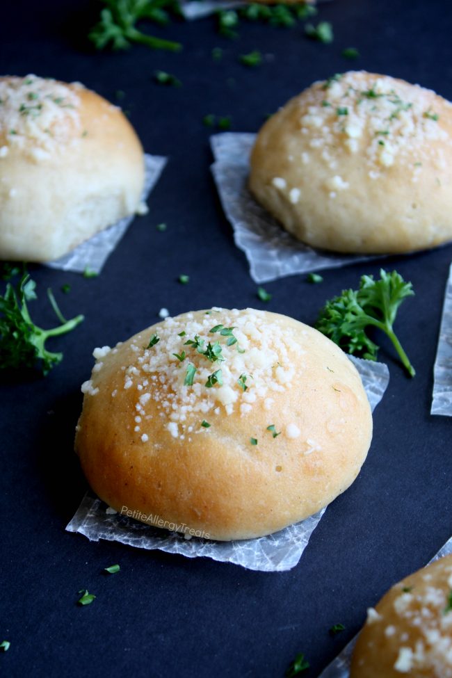 Gluten Free Vegan Dinner Rolls Recipe (dairy free vegan)- Light and fluffy garlic parmesan gluten free rolls or hamburger buns. Soft and delicious warm from the oven. Food Allergy friendly too!